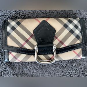 Burberry wallet. Some wear (scuffs) you can see in photos. No rips or tears.